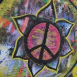 round multicolored peace sign wall art