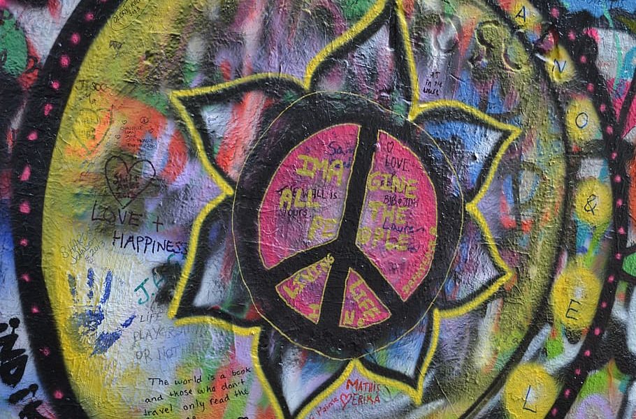 round multicolored peace sign wall art