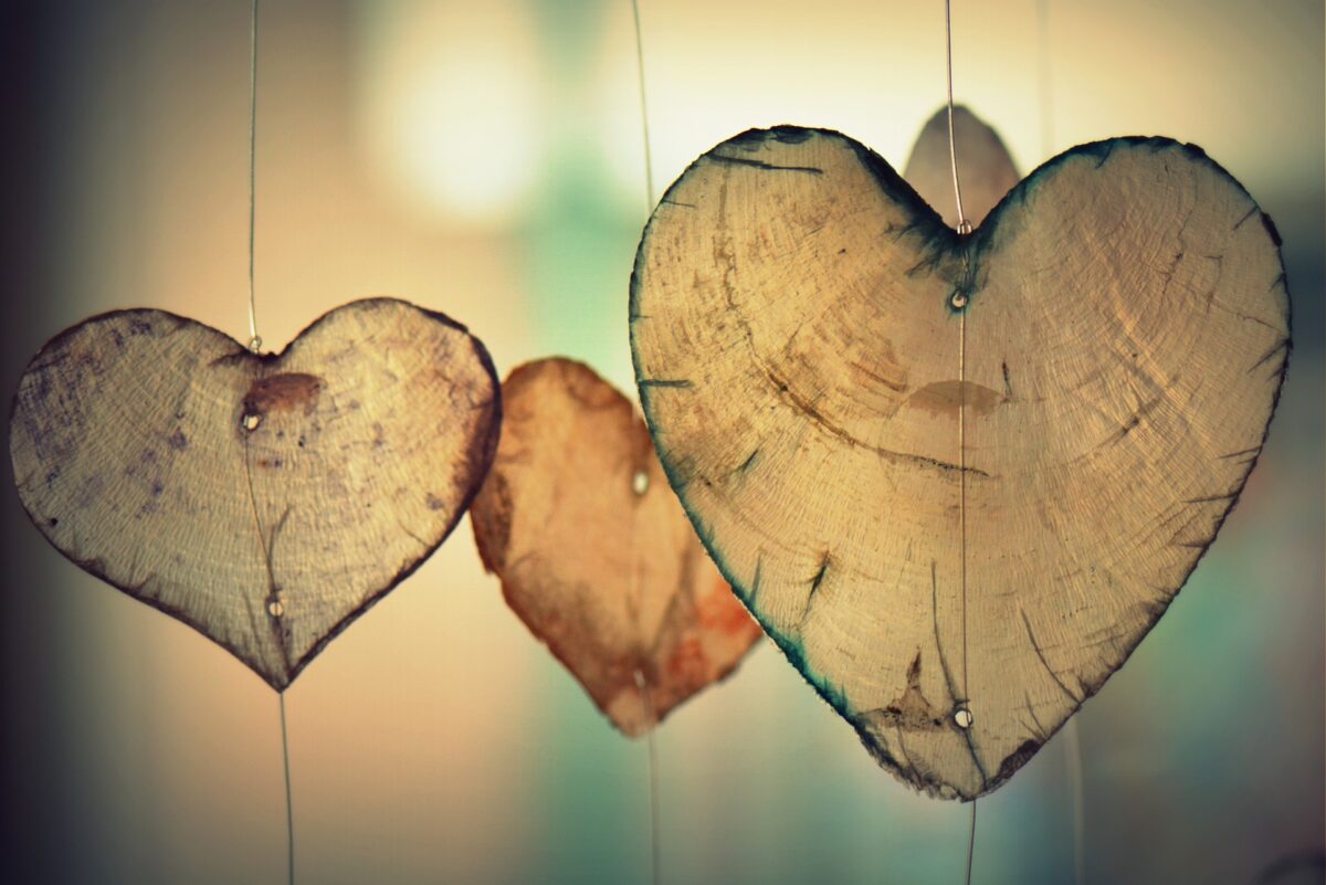 Three heart shapes made from wood